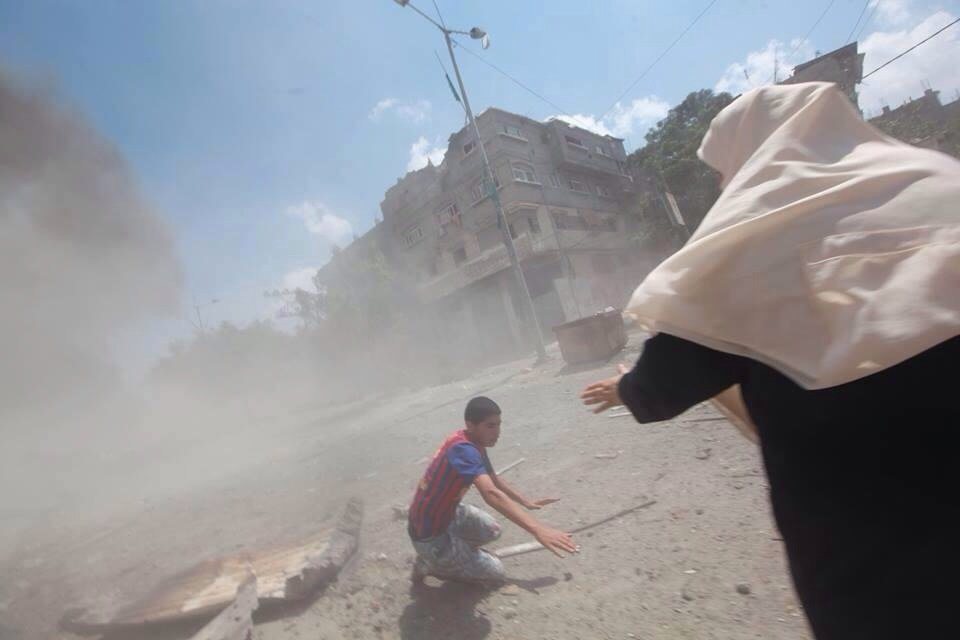 Palestinian woman rescues boy